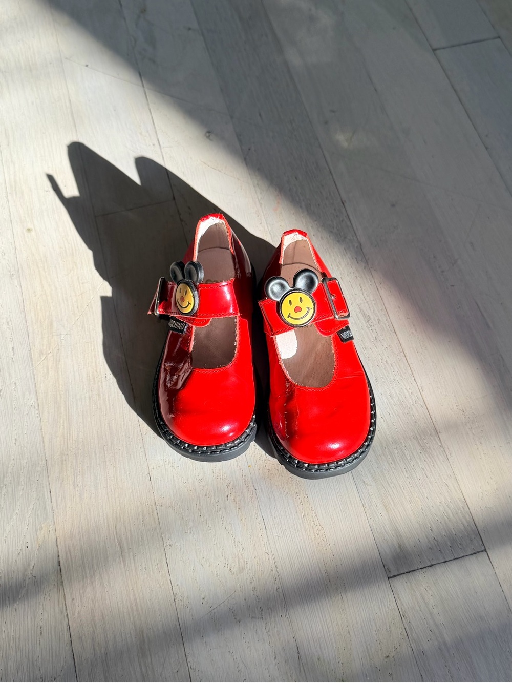 MOSCHINO Red Patent Mary Jane Shoes with Smile Charm